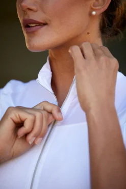 Hot Ascent konkurranseskjorte med 1/4 glidelås for kvinner Stevne